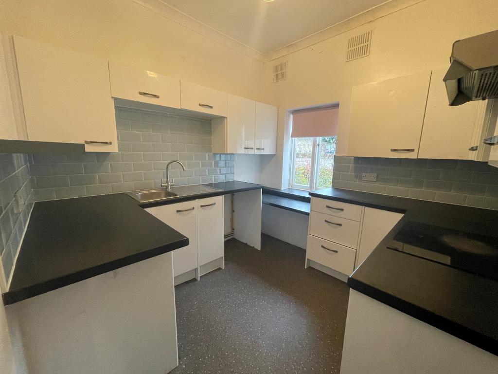 Lot: 66 - TWO-BEDROOM BUNGALOW - Modern kitchen with fitted units